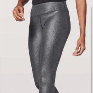 NWOT foil luminosity leggings in silver. Size 8